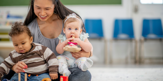 "They need to learn that we cannot hold them all day!" The critical work of holding babies in Early Childhood Settings